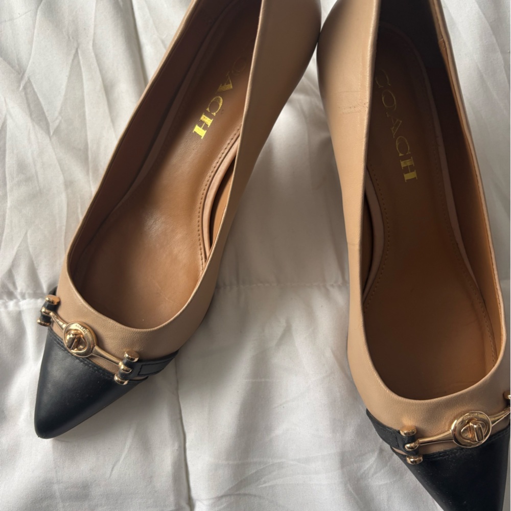 Coach Black and Tan Pumps with Pointed Toe and Metal Accent
